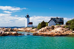 Annisquam Harbor Lighthouse Among Shoreline Rocks